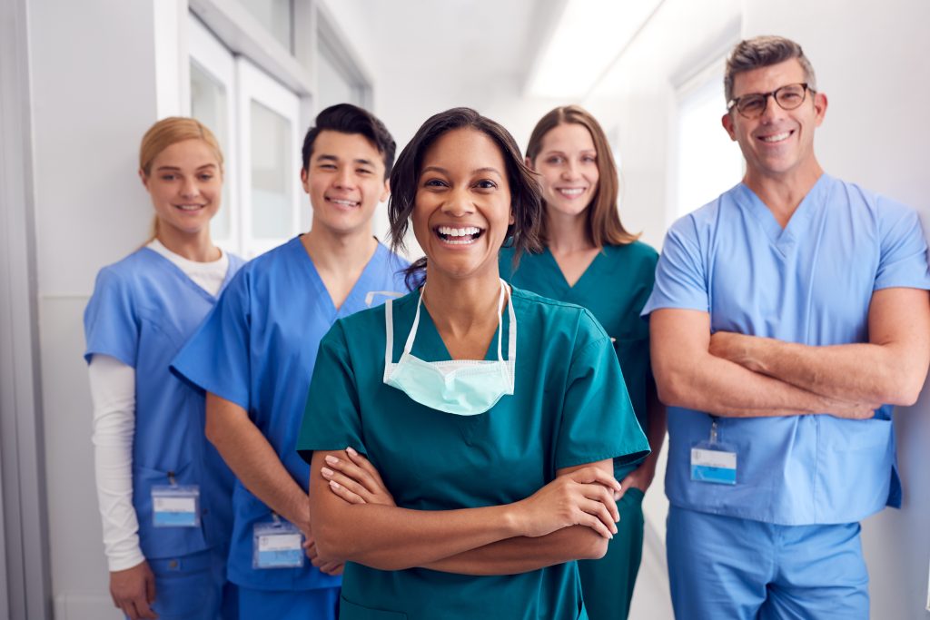 A diverse group of health care workers in a hospital