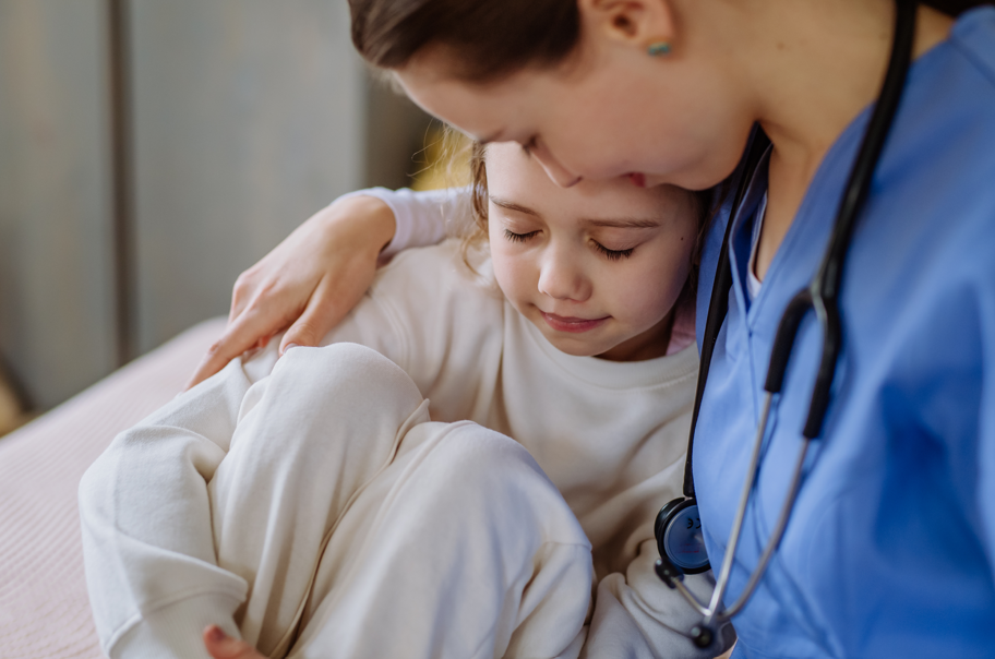 A child and provider in the hospital